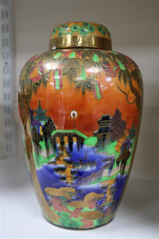 A Daisy Makeig-Jones for Wedgwood. A Willow pattern Flame Fairyland lustre Malfrey vase and cover, height 24.5cm, cover broken and rest